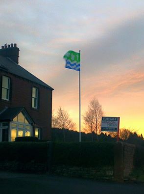 the-cumberland-flag-flying-in-the-dawn-light-on-beacon-edge-penrith-thanks-to-philip-tibbetts
