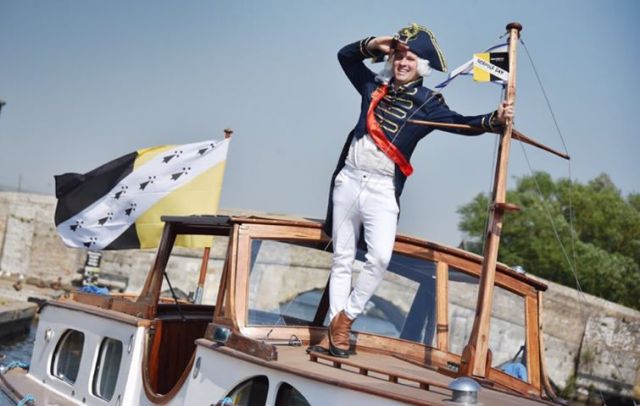 A splendid evocation of arguably Norfolk_s most famous son, alongside the county flag!