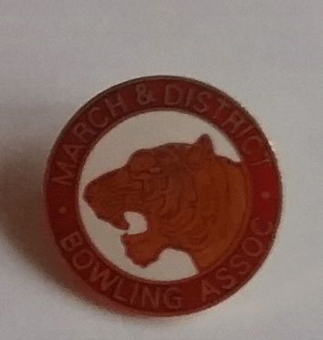 the Fen Tiger on the badge of the president of the March and District Bowling Association