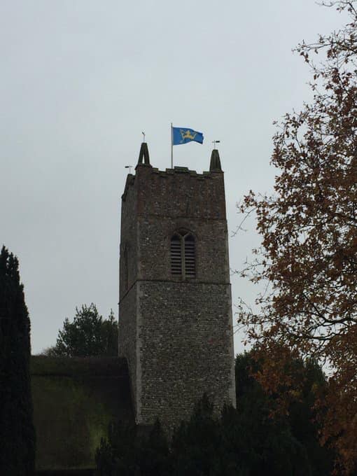 Residents of Ringsfield in Suffolk raise their county flag over the village’s All Saints church3