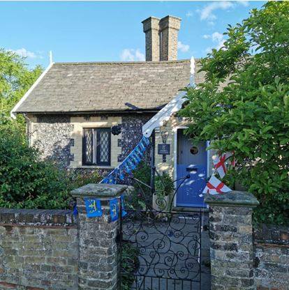 The Suffolk County flag decorating Neil Boast's cottage.