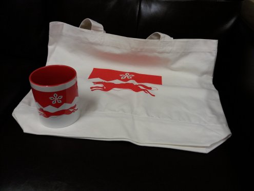 A tote bag and mug bearing the Leicestershire Fox and Cinquefoil.